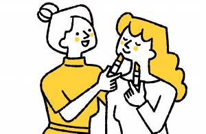 メイクしてもらう女性のイラスト
